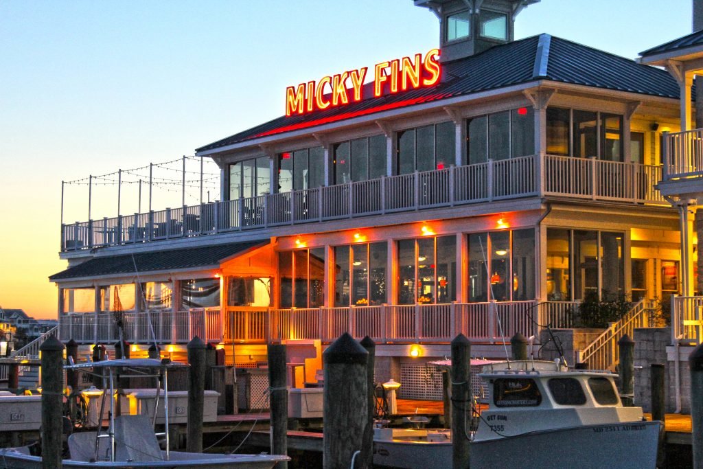 A restaurant above a dock called Micky Fiins